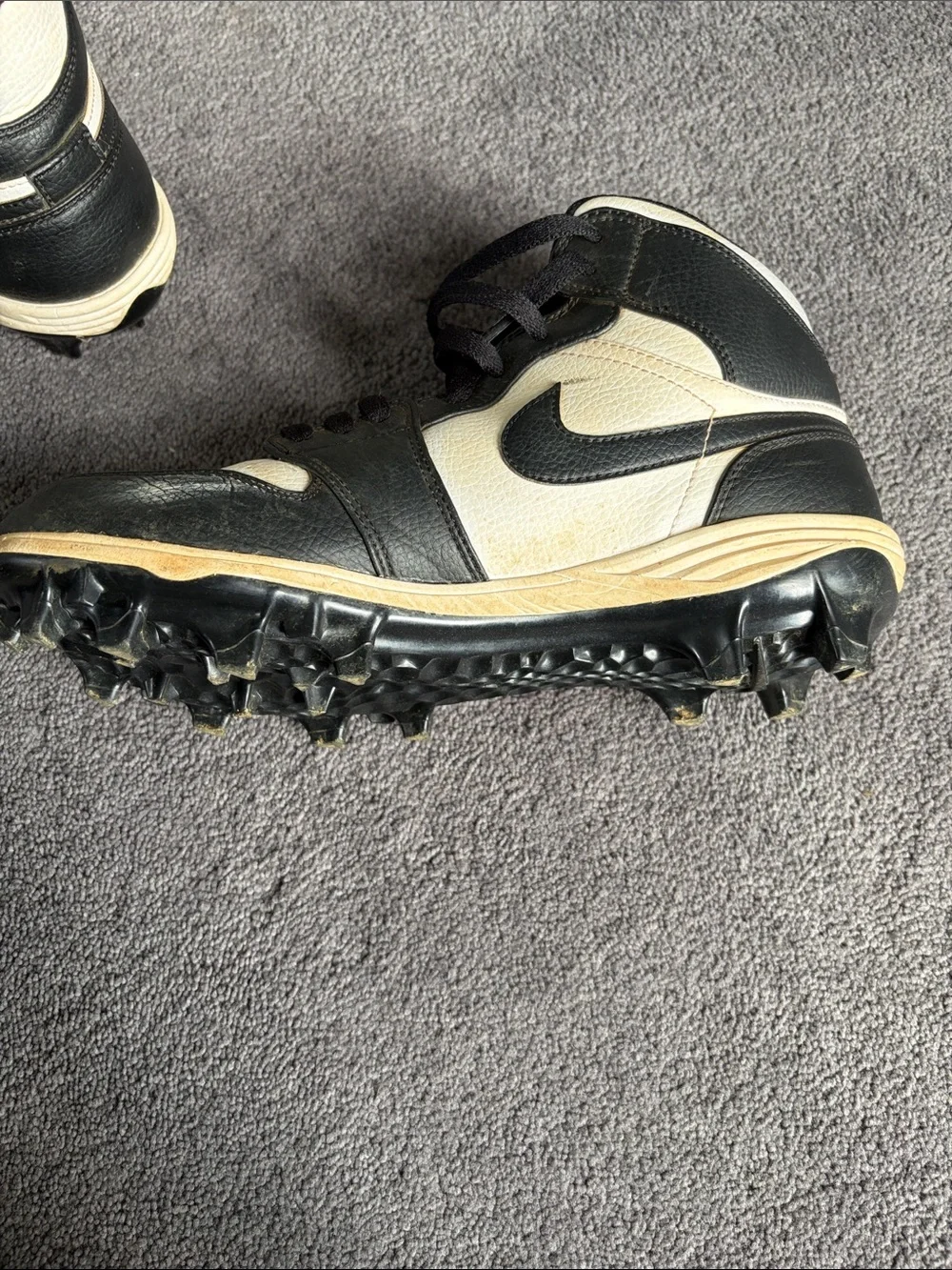 Nike Men’s Black and White High-Top Athletic Cleats